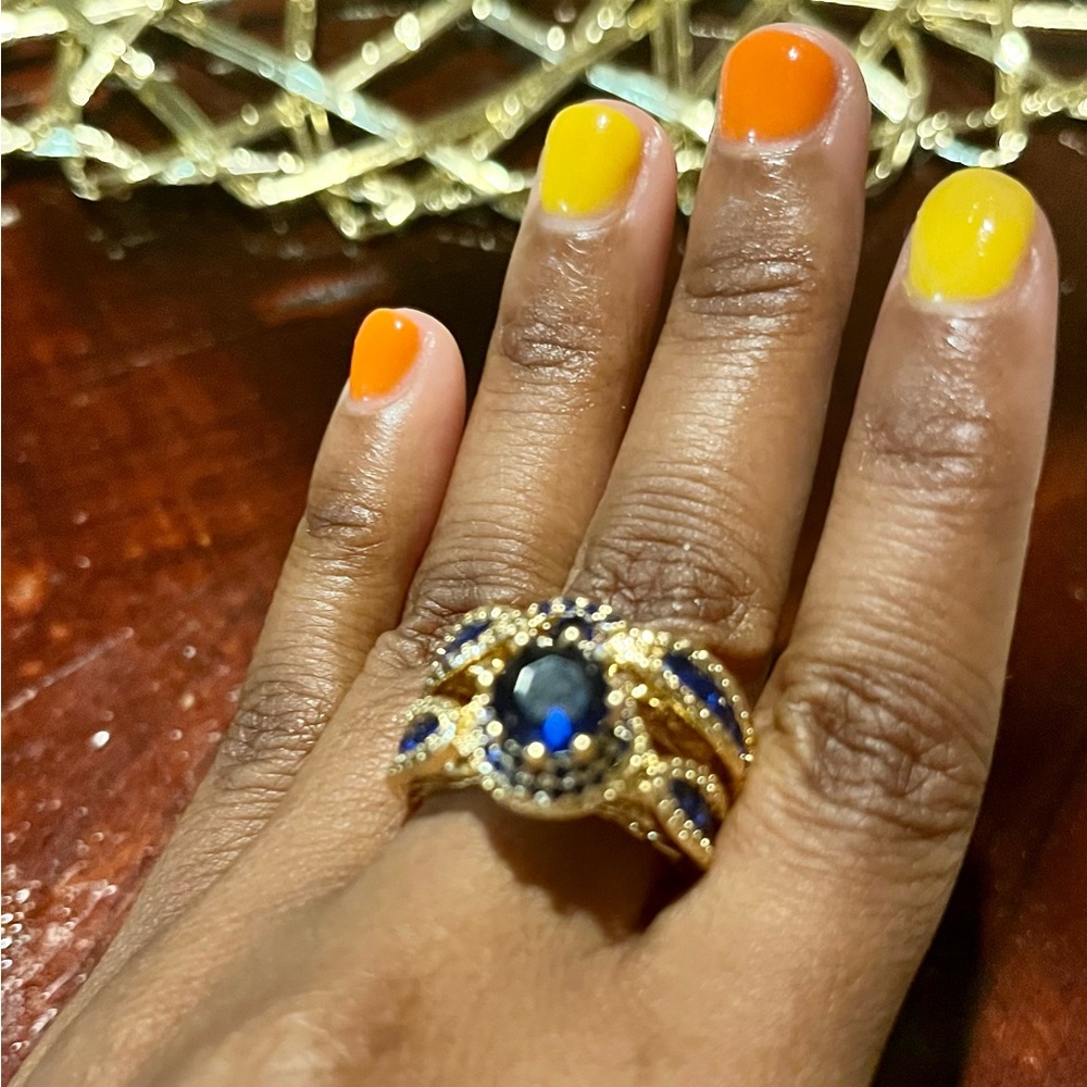 A gorgeous, blue and gold ring set size 7 fashion rings